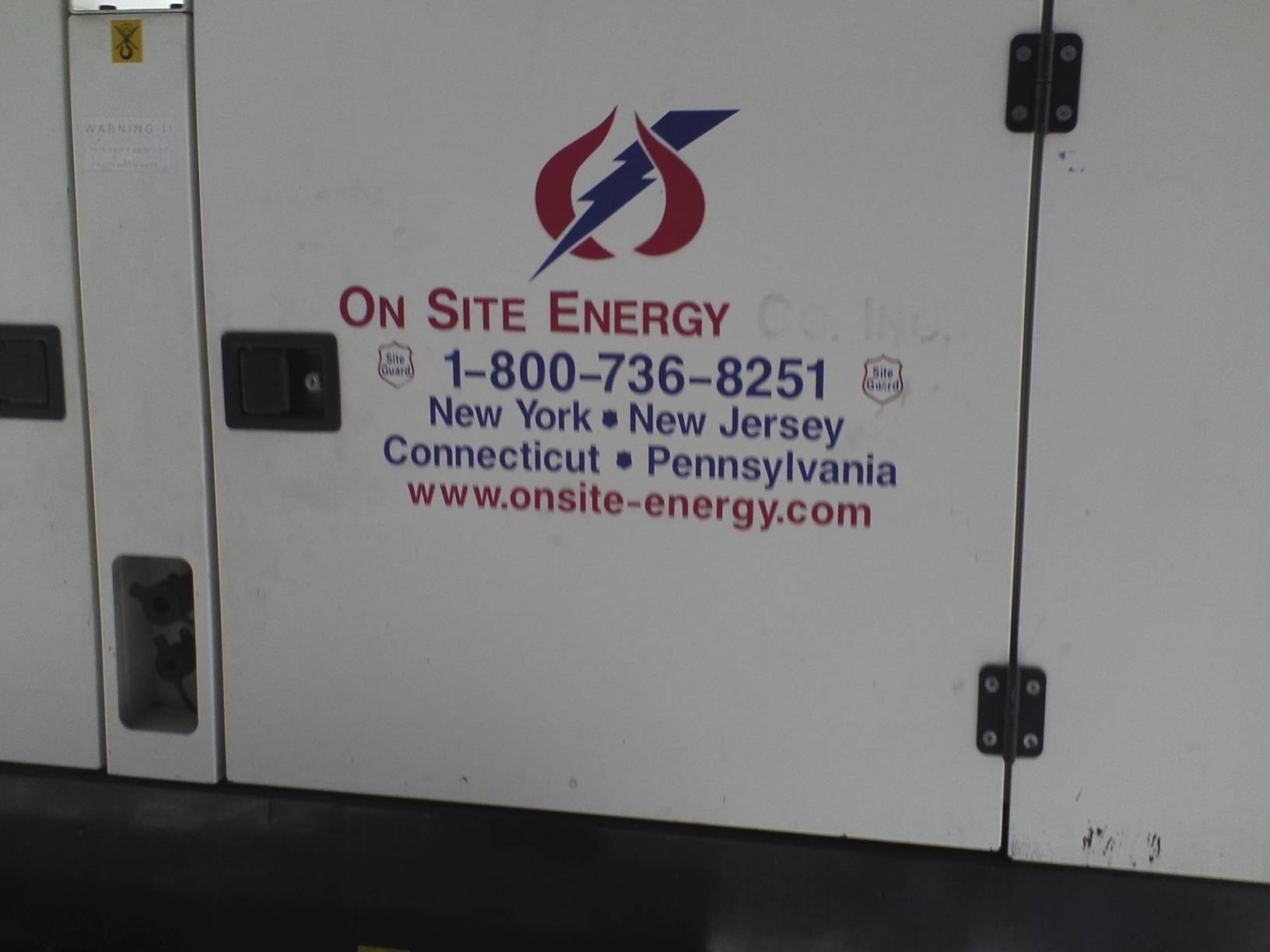White generator panel with On Site Energy logo, phone number, and service area text
